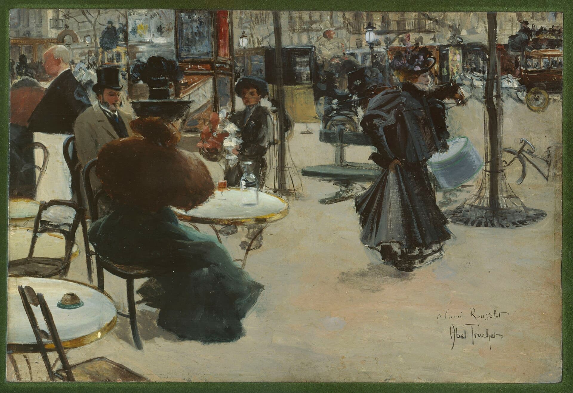 Terraço de café parisiense com mesas voltadas para a rua